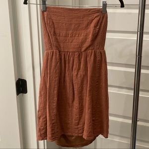 strapless pink orange dress that ties in the back